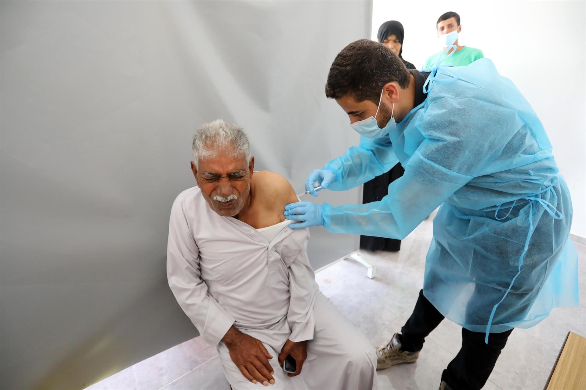 Palestinian Territories, Khan Younis A Palestinian man receives a dose of the Covishield vaccine against Covid 19, at a temporary vaccination centre set up in Khan Younis. Photo Ashraf AmraAPA Images via ZUMA Press W